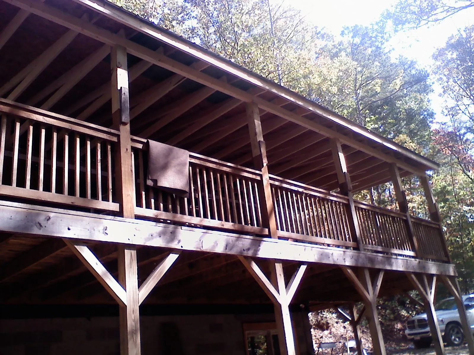 Timber framing under a new elevated porch and deck — Roof Leak Repair in Sunapee by Roofing Brothers